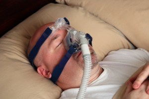 A man sleeping with a Cpap mask