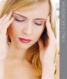 TMJ treatment with a woman holding her temples